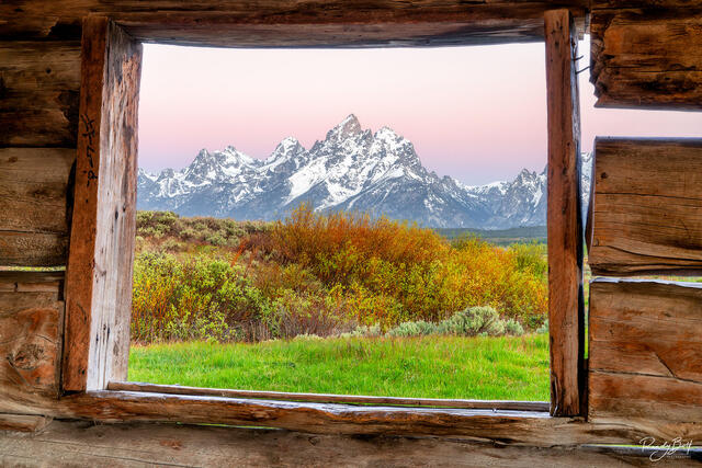 Sunrise at the J.P. Cunningham cabin with Grand Teton mountains in the background.