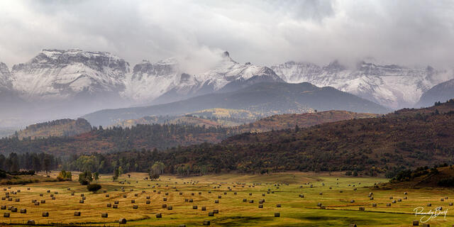 Haybales and Mount Sneffels at sunrise in the Double RL Ranch owned by Ralph Lauren.