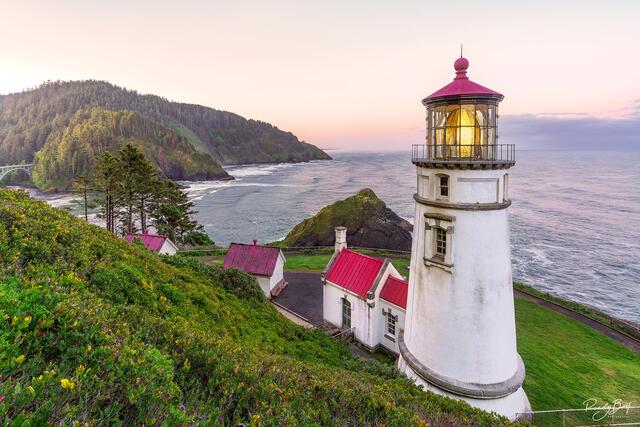 Heceta Head Lighthouse at sunrise on the Oregon Coast.
