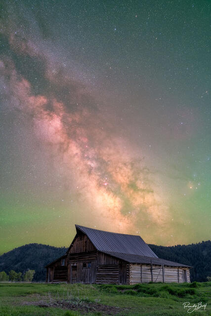 Milky way galaxy stretches over the T.A. Moulton barn on a clear night in Grand Teton National Park.