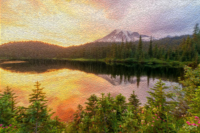 sunset glow on mount rainier with wildflowers