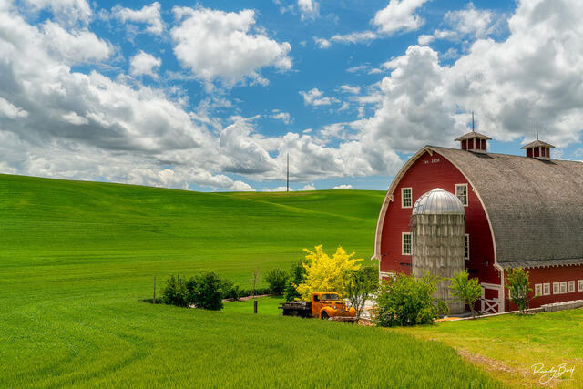 The famous red Barn and orange truck in Colfax, Washington.