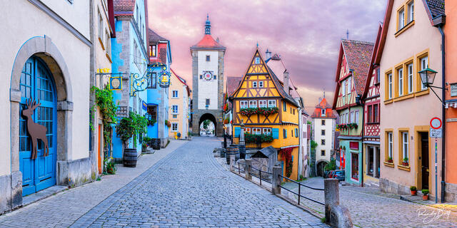 panorama view of the Plonlein in Rothenburg Ob Der Tauber, Germany at sunrise.