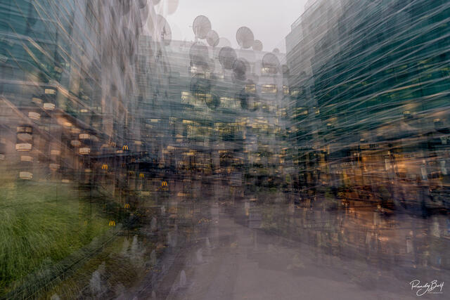 Komo 4 building edited using multiple exposures to create an abstract image.