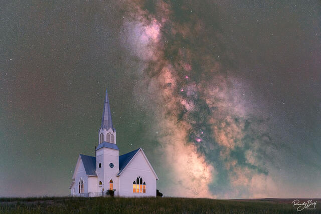 Zion United Methodist Church and the Milky Way galaxy shining bright in the night sky.