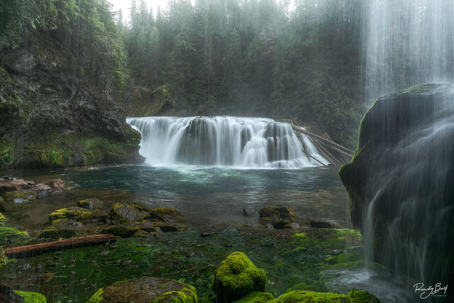 This captivating photograph showcases the beauty of Lower Lewis River Falls in southwest Washington state.