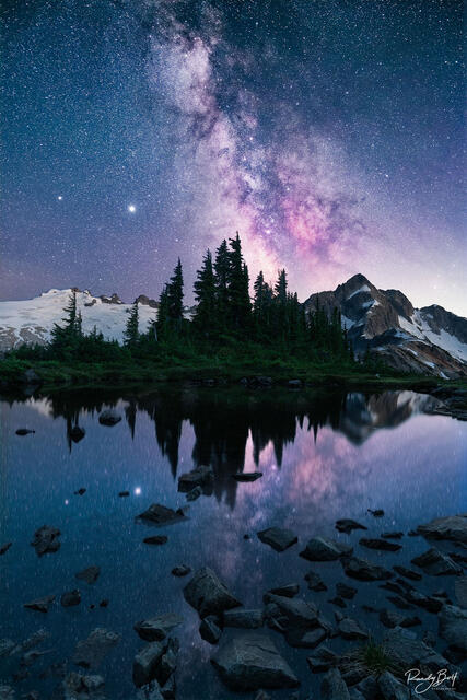 Milky Way galaxy over mount challenger and what com peak in the north cascades national park