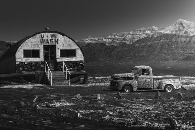 black and white fine art image of the Tecopa U-WE Wash and old truck