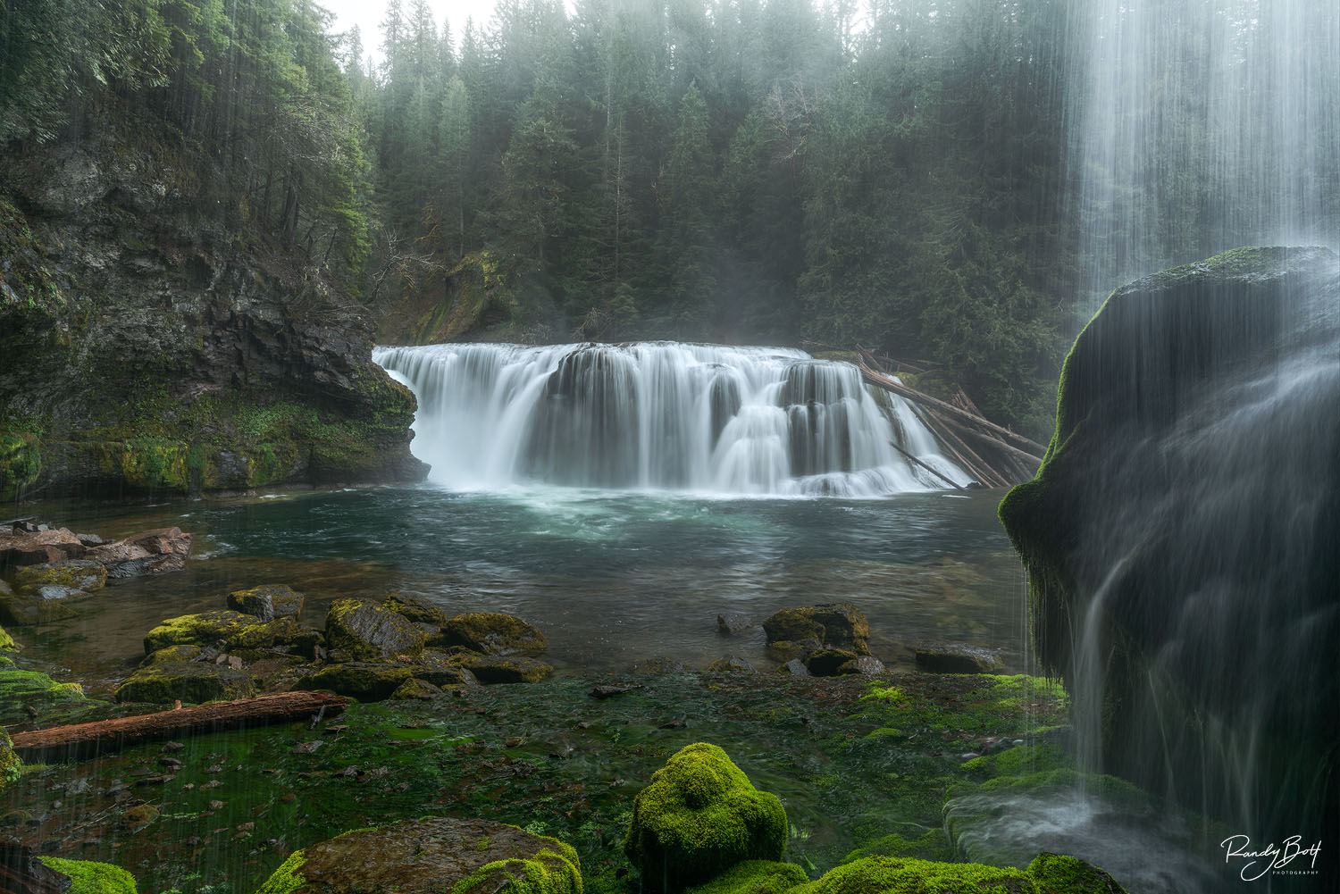 This captivating photograph showcases the beauty of Lower Lewis River Falls in southwest Washington state.